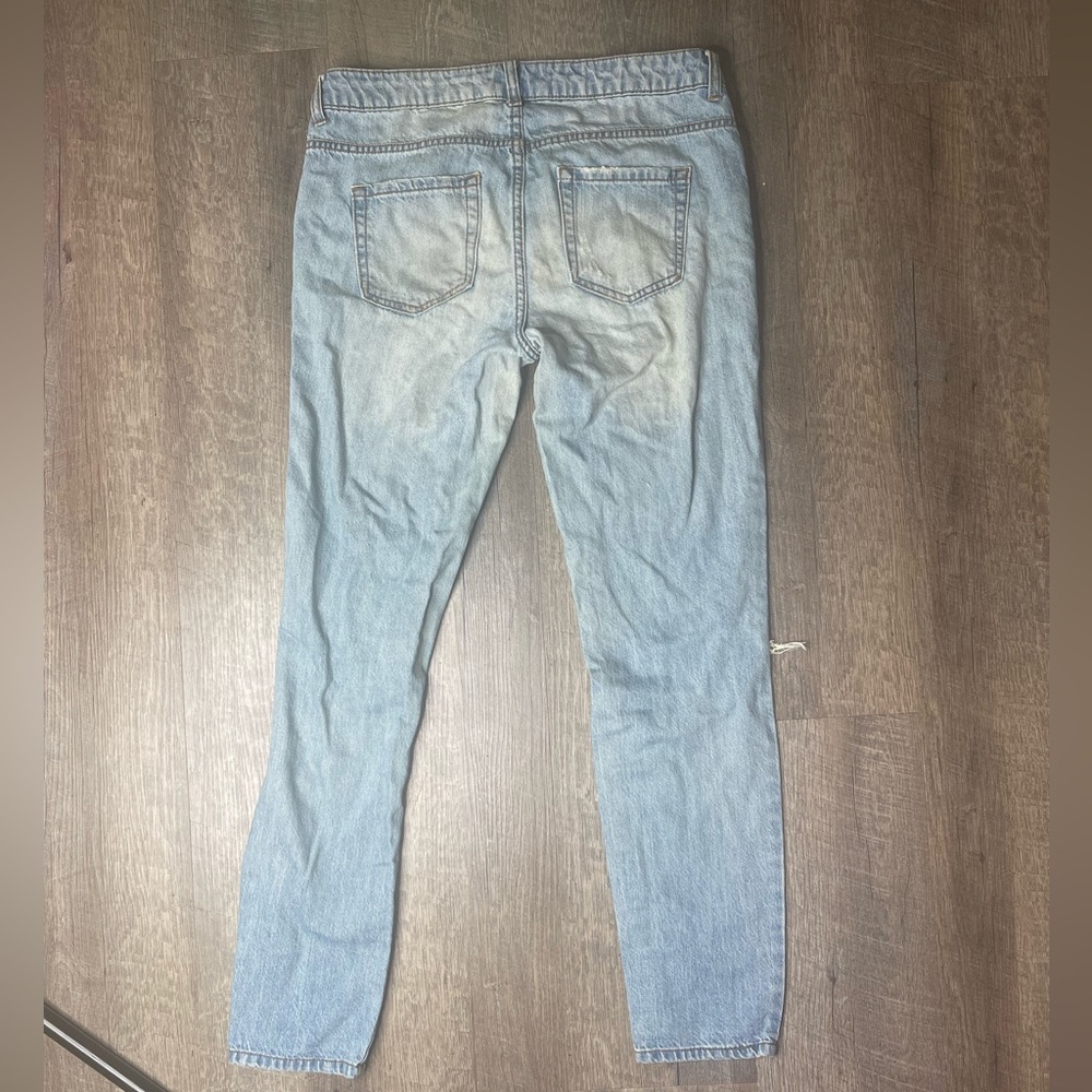 Light blue ripped jeans size 28 in women’s